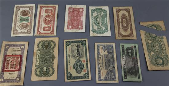 A collection of old Chinese bank notes